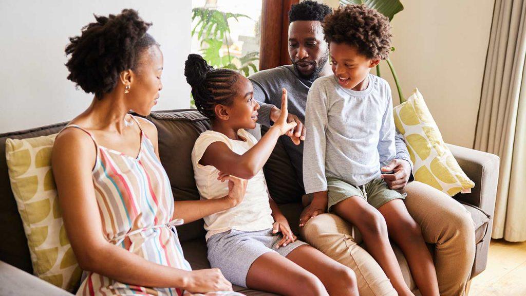Parent using calm family communication to build emotional safety and trust