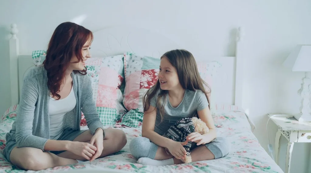 Calm parent child discussion during the middle childhood years about home expectations