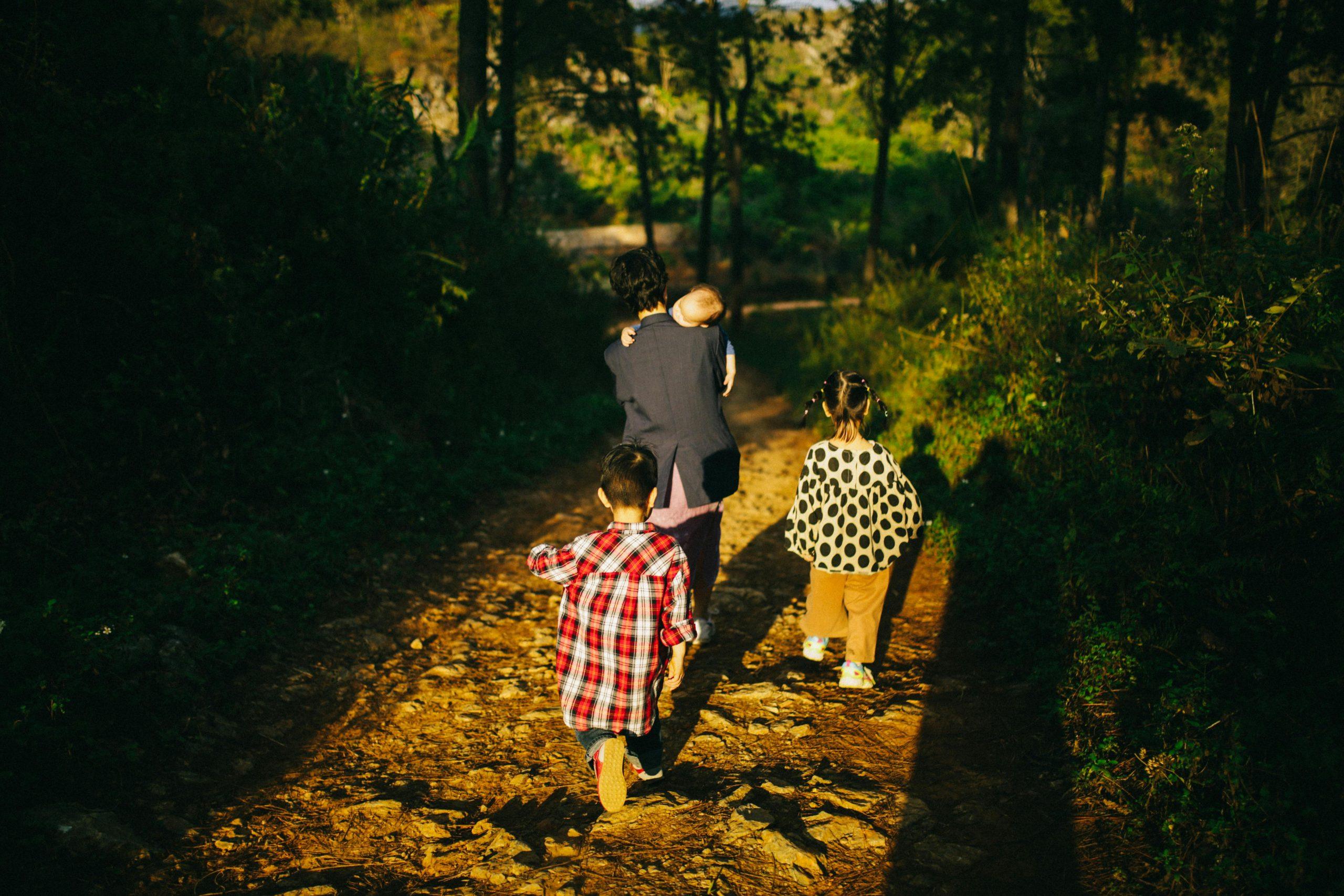 Family taking a familiar seasonal walk together in nature