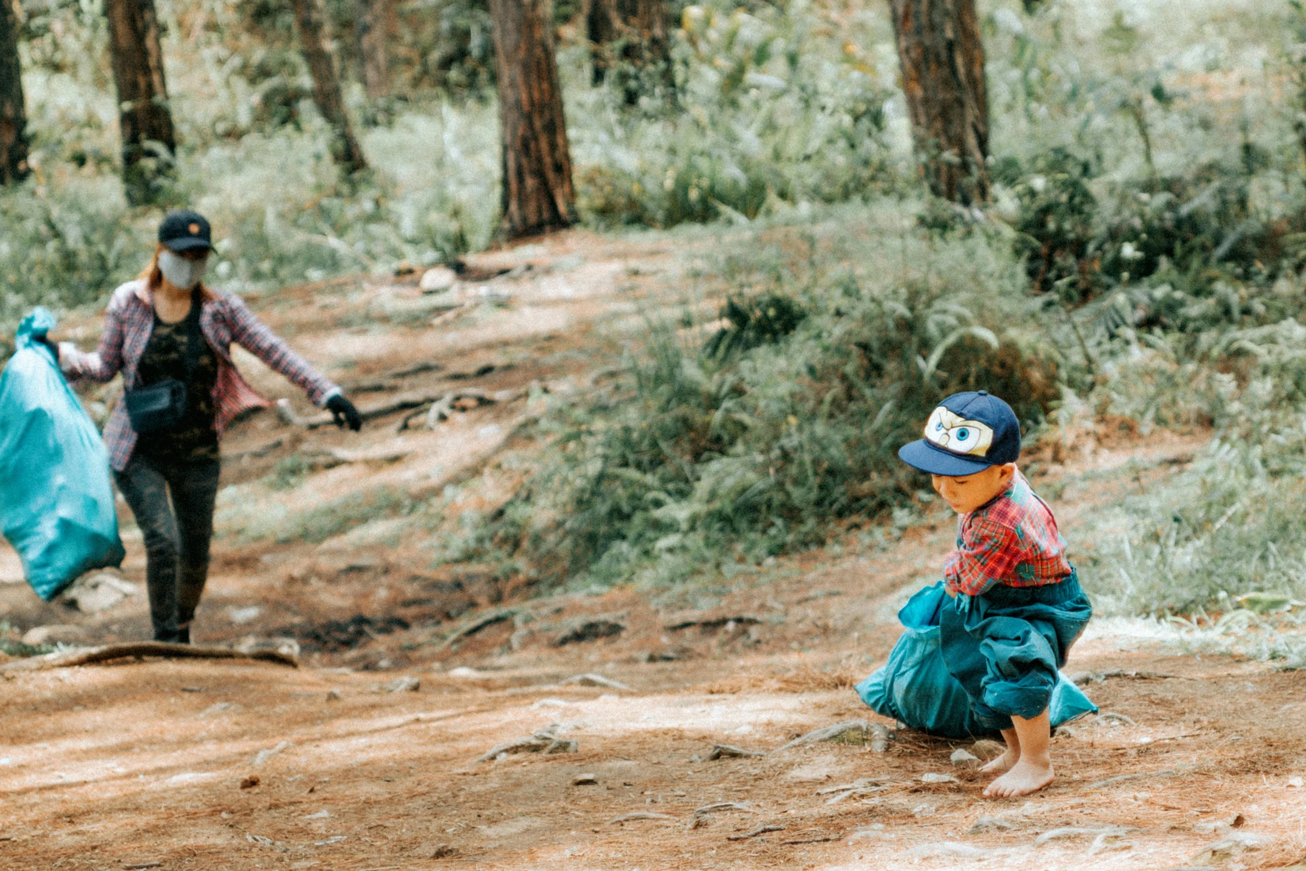 Spring family activities with a child helping during outdoor seasonal cleanup