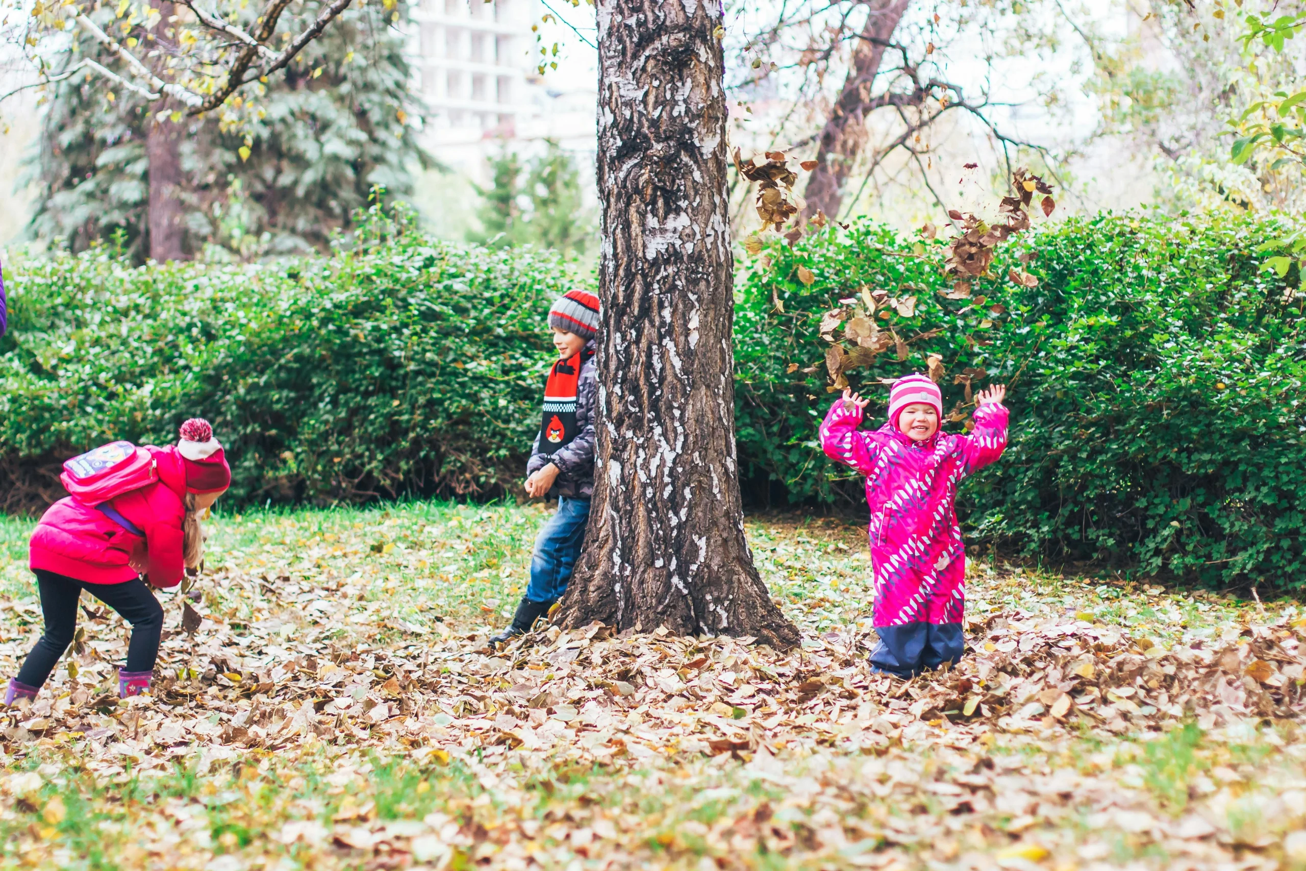 Spring family activities with children exploring seasonal changes outdoors