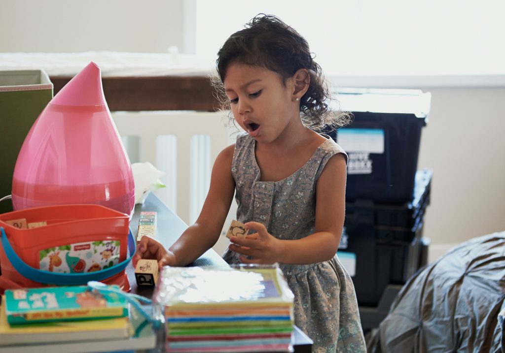 Tween behavior showing growing responsibility with school materials and routines