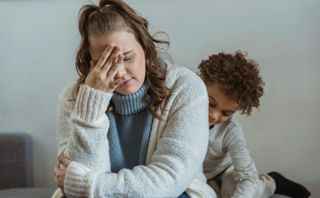 Parent supporting frustration tolerance during emotional milestones in early childhood