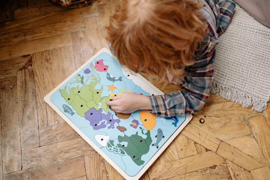 Child building school readiness skills through early learning and problem-solving