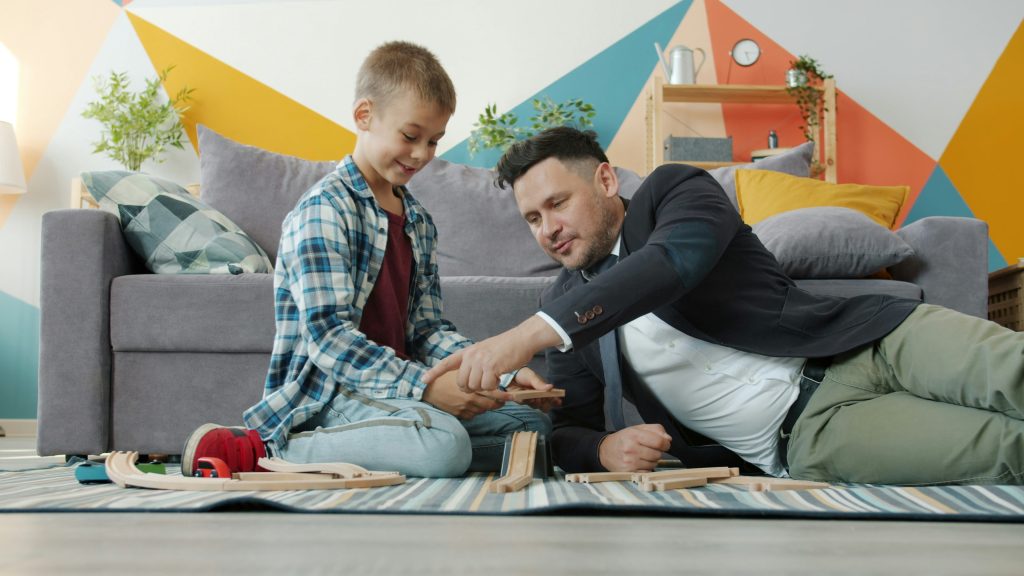 Indoor family activities with parent and child doing a scavenger hunt at home