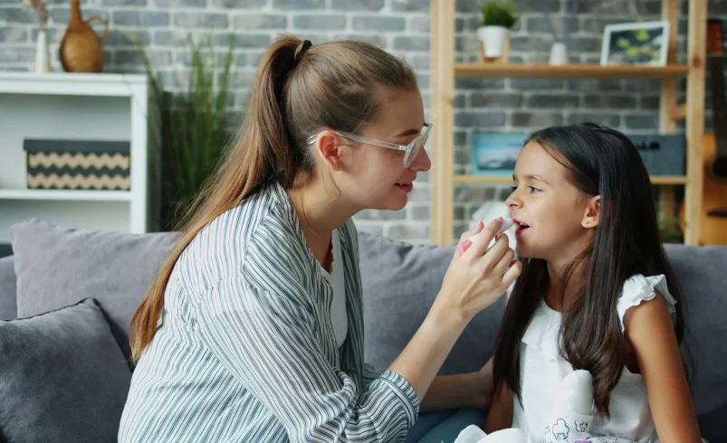 Parent and child during the middle childhood years talking at home