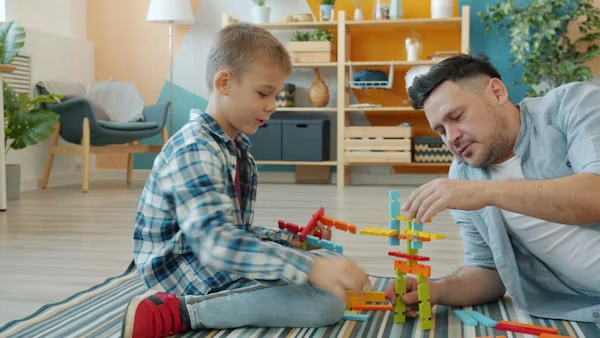 Child development through play as children repeat favorite games at home
