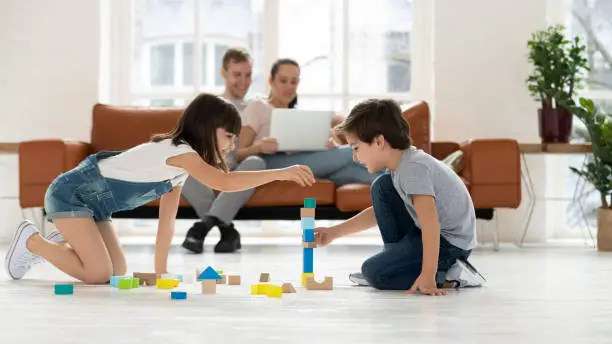 Confidence through play as children repeat favorite games during home routines