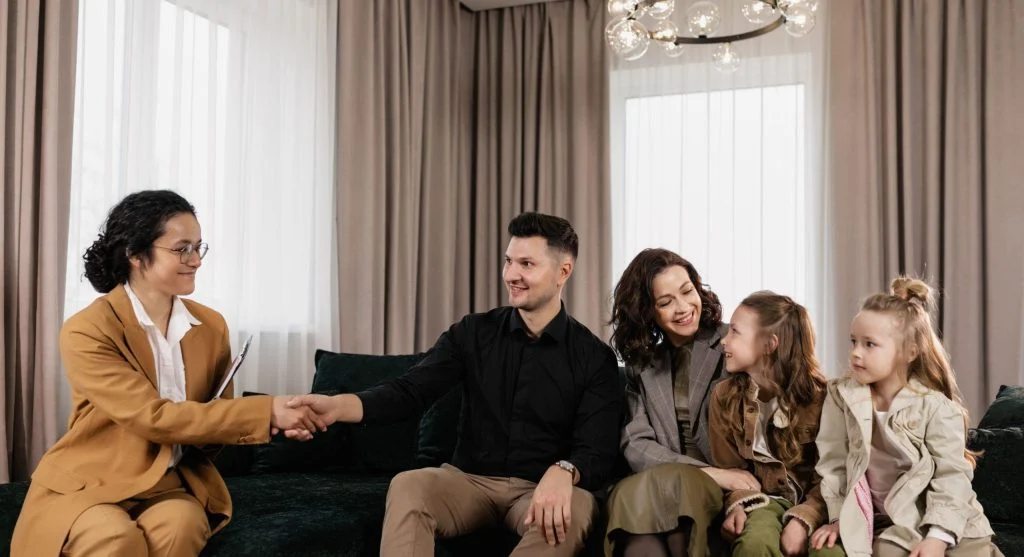 Parent calmly explaining a family decision during a fairness conversation