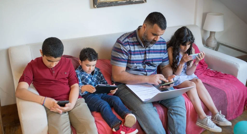 Balanced family routine showing a healthier approach than common screen time myths