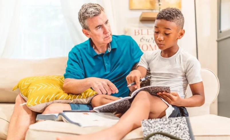 Parent and child discussing a daily decision together at home