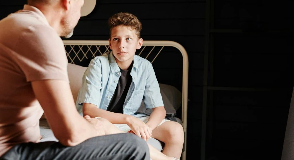 Child feeling uncomfortable during a hard conversation at home