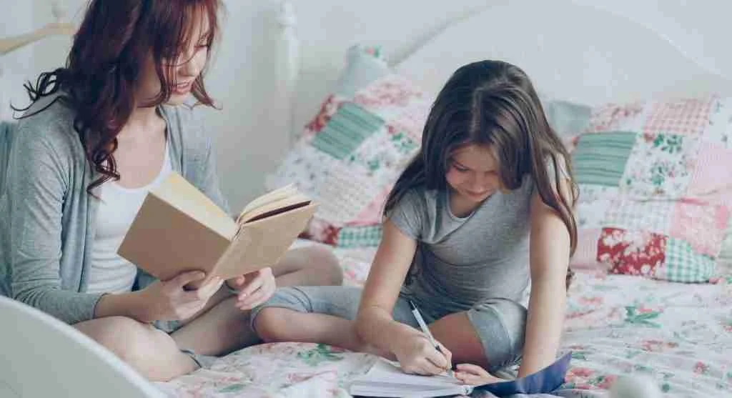 Parent and child using a shared notebook to continue a difficult conversation