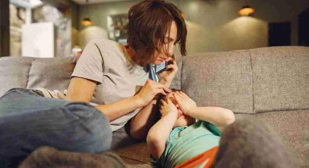 Child asking a trusted adult for help with a concerning voice note