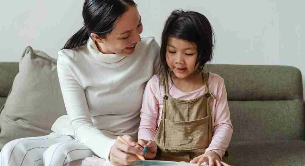 Parent helping a child turn repeated humor into a creative activity