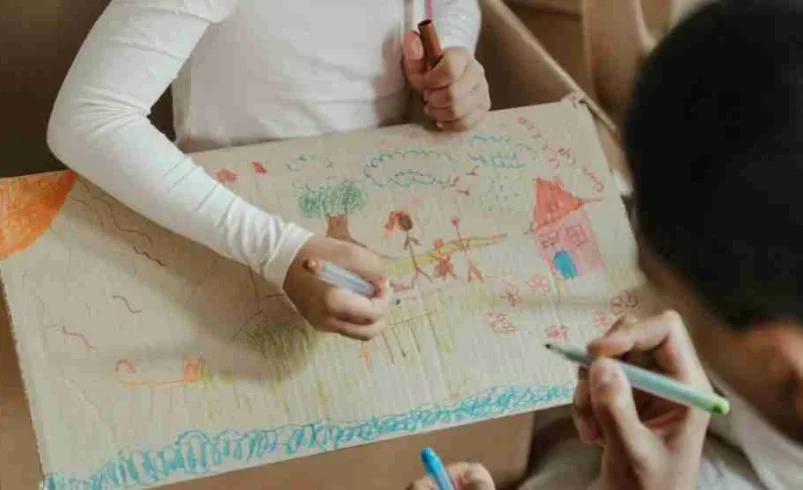 Child creating repeated versions of the same drawing