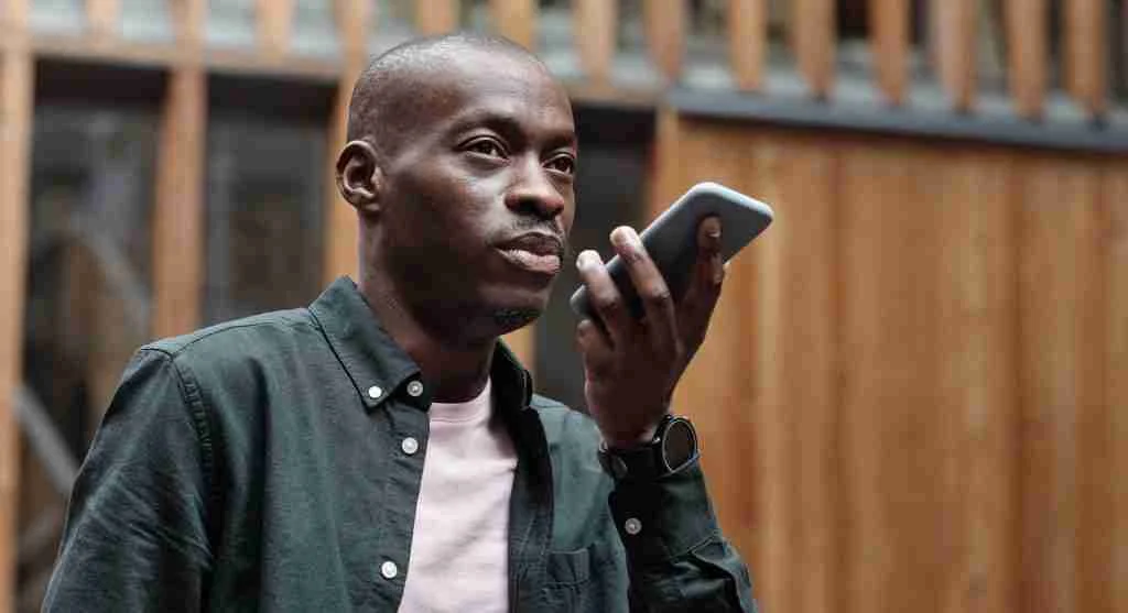 Child checking background privacy before sending a voice message