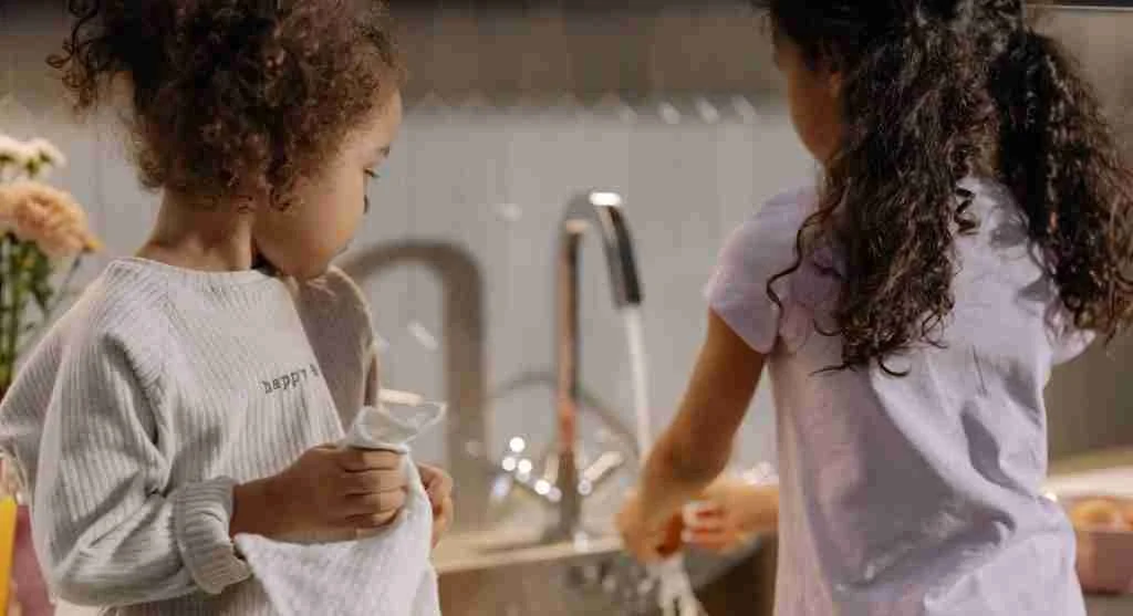 Child joining an ordinary family task during unstructured time