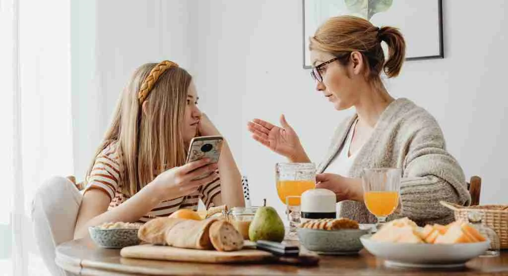 Parent helping a tween prepare for a difficult conversation