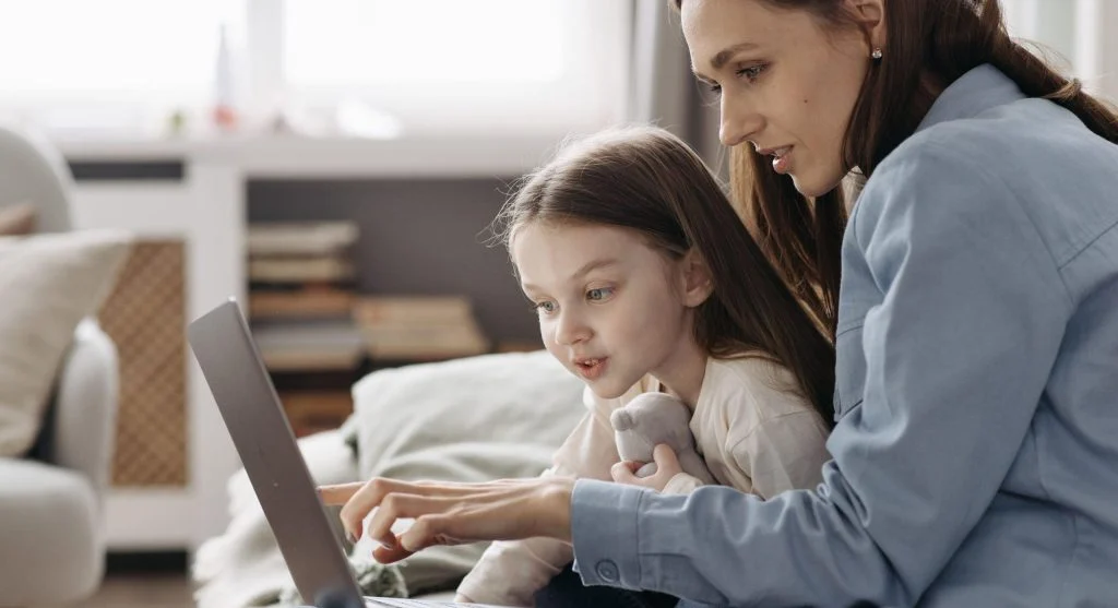 Child hesitating to share school information with a parent