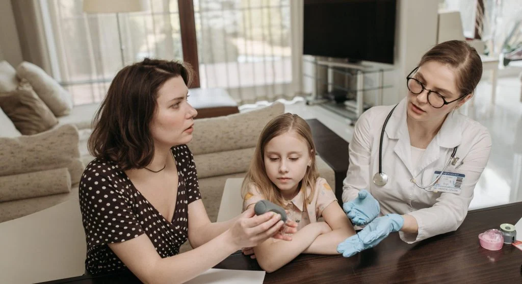 Parent listening carefully while a child explains a different version of what happened