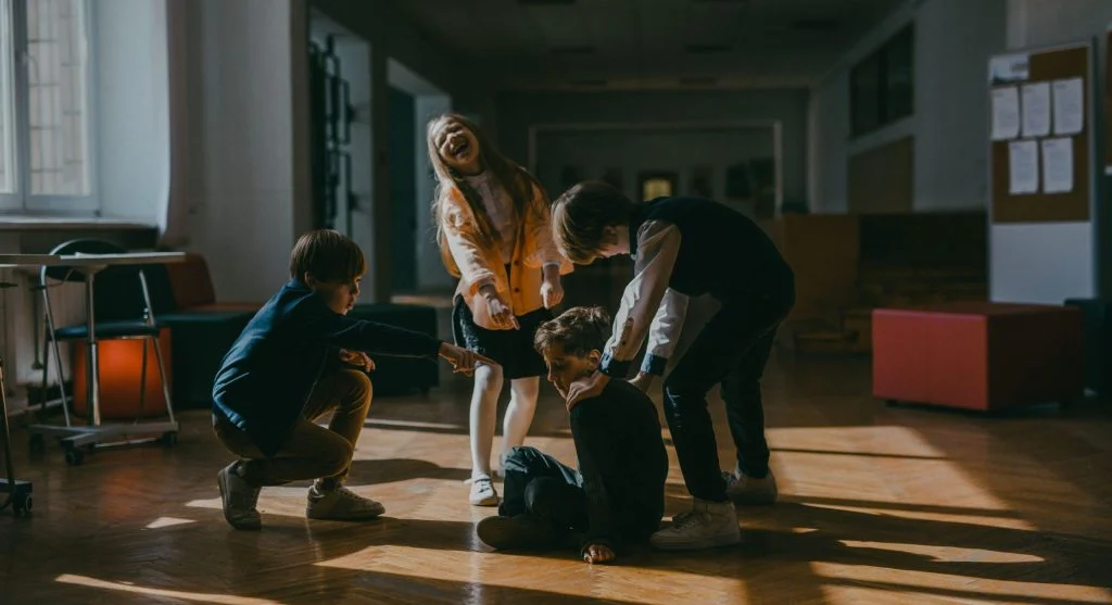 Child noticing peer group inclusion during a social moment