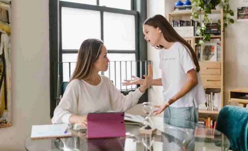 Parent helping a child learn how to correct others respectfully