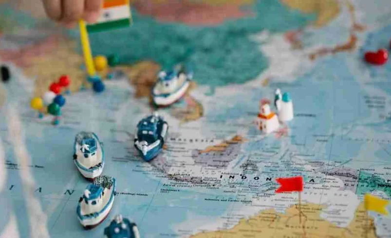 Child fascinated with maps and tracing routes