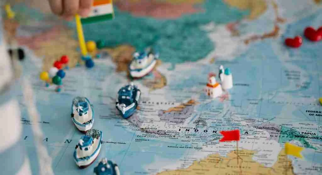 Child fascinated with maps and tracing routes